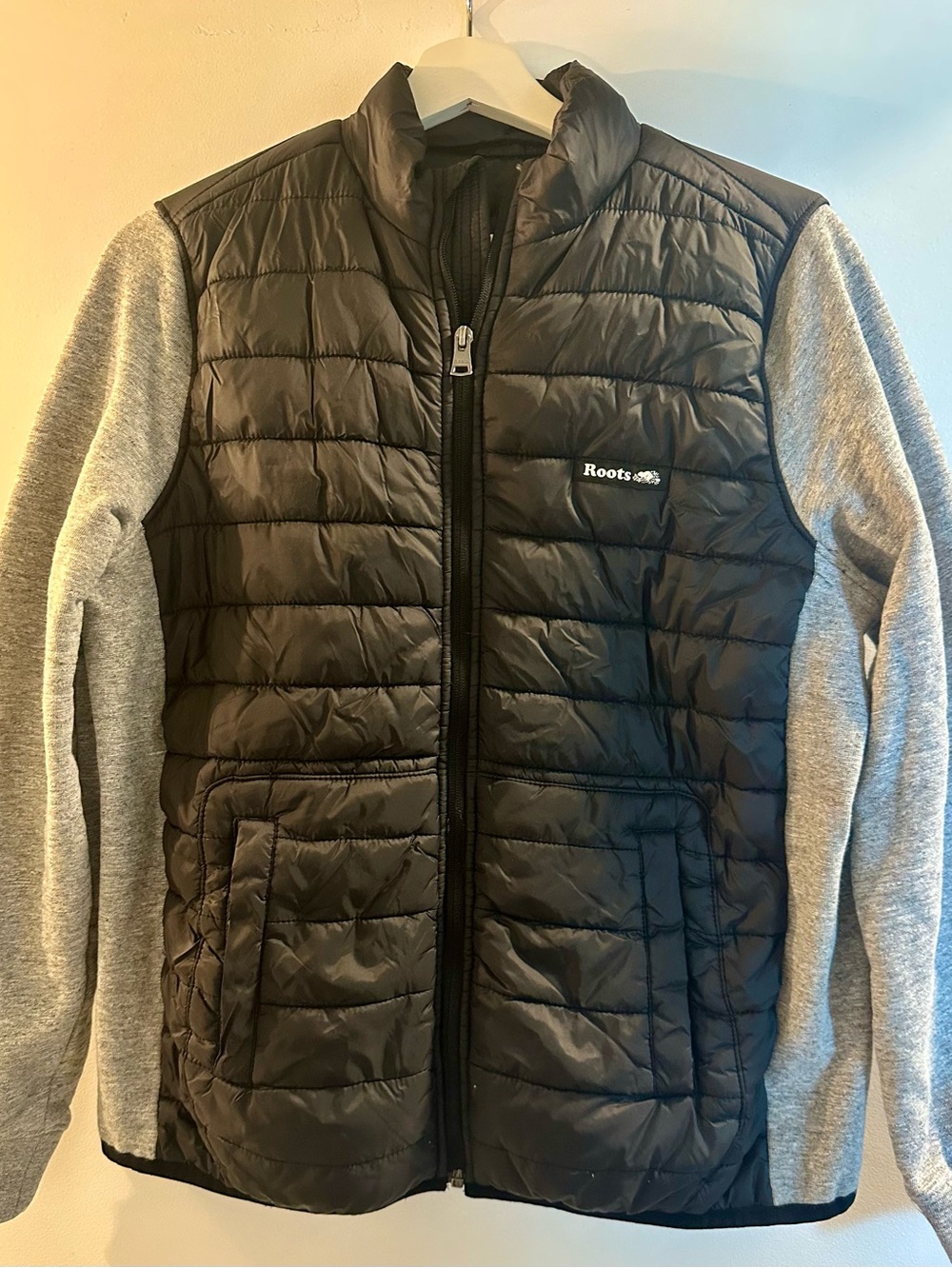 Roots women’s Black Quilted Jacket with Grey Knit Sleeves
